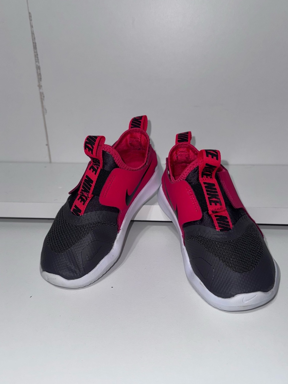 Nike Kids Slip-On Sneakers in Black & Red